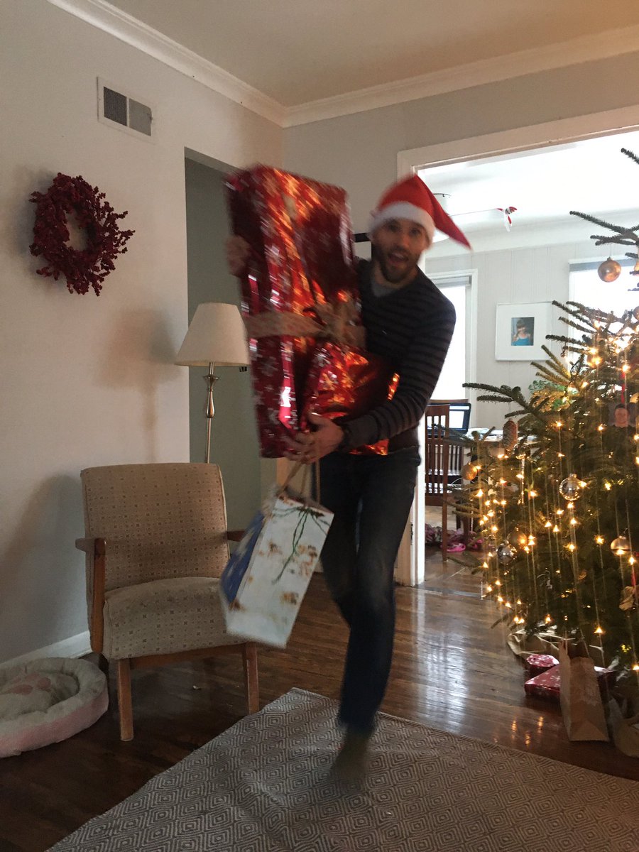CouncilWhitmer's tweet photo. Is @epuff Santa or the Grinch? Looks like he might be trying to open his present early! https://t.co/LUjkSEgj2Z