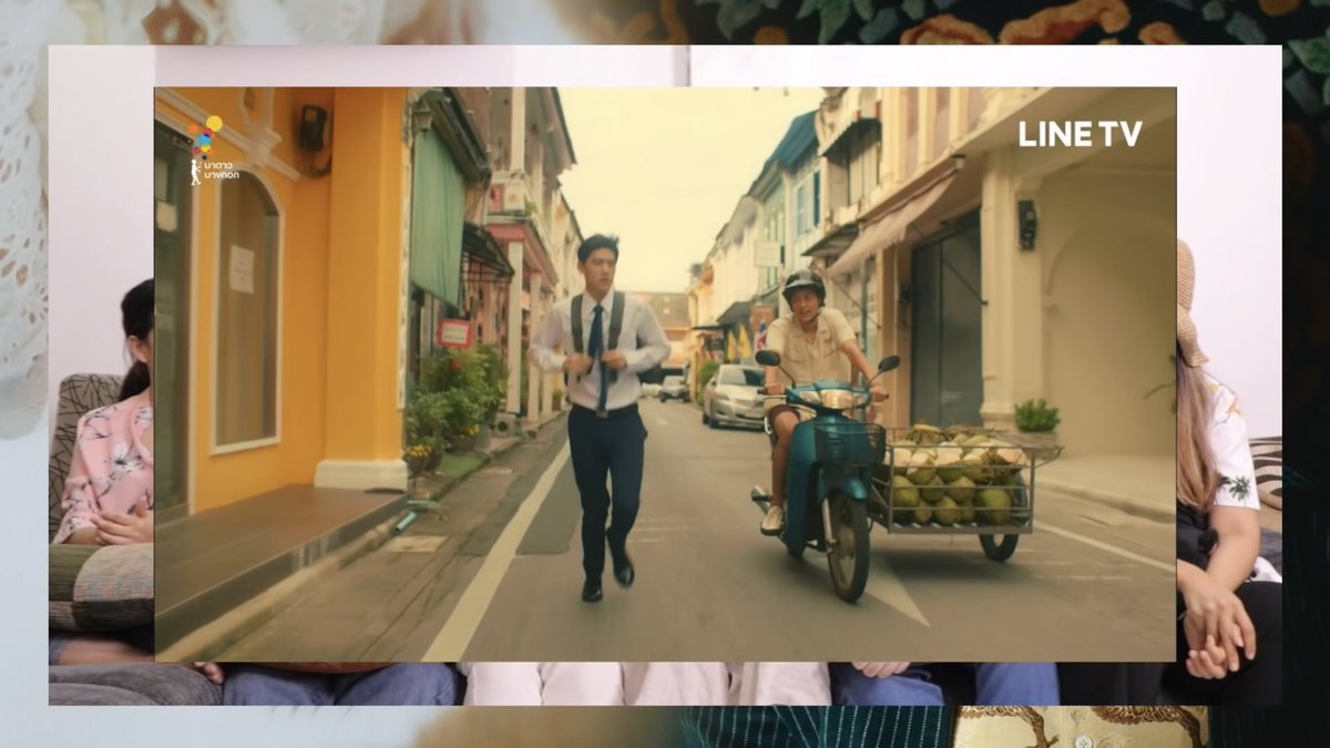 At first the team designed that Teh‘s family‘s business is selling coconuts. Thay changed to selling Hokkien Mee but still wanted to do the scene of Teh giving coconut to Oh-aew. So they made Oh-aew a person who likes coconut, and later extended to Oh-aew‘s scent of coconut.