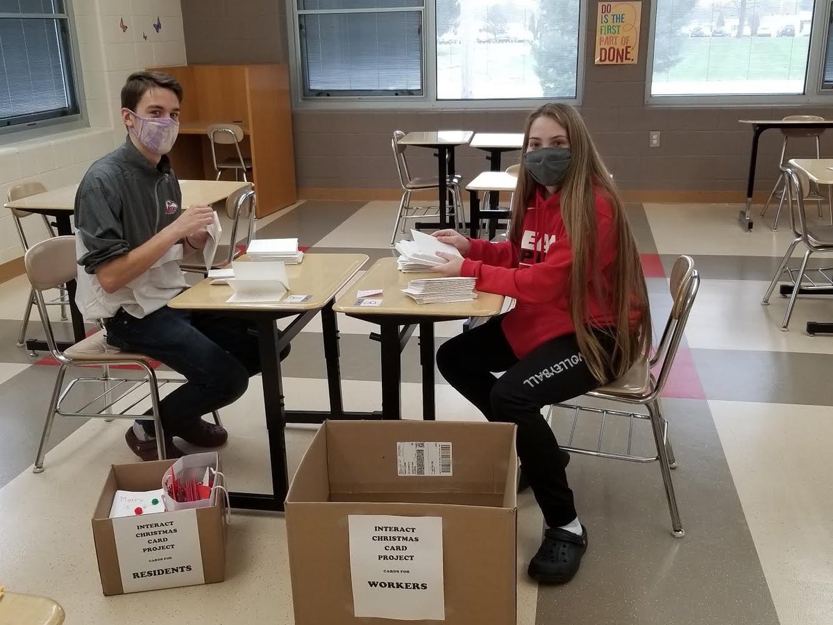 Kaylee Caswell &amp; Zachary Tidwell packing up over 540 Christmas cards to be delivered to residents and health care workers at five Geneva nursing homes.