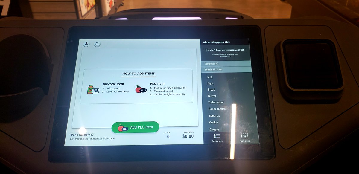 This is a tour of the cart. You use the scanner to the right to scan a QR code from your Amazon app to sign in. A touch screen tracks your purchases. Points for the purse hook and the dual-purpose drink or phone holder.