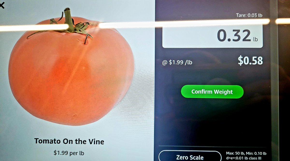 I had issues with this solo tomato. It took four attempts to get it to pick up the weight. Upon exiting the store, I had to review these images with a clerk to ensure I wasn’t shoplifting a 58-cent tomato.  #retail