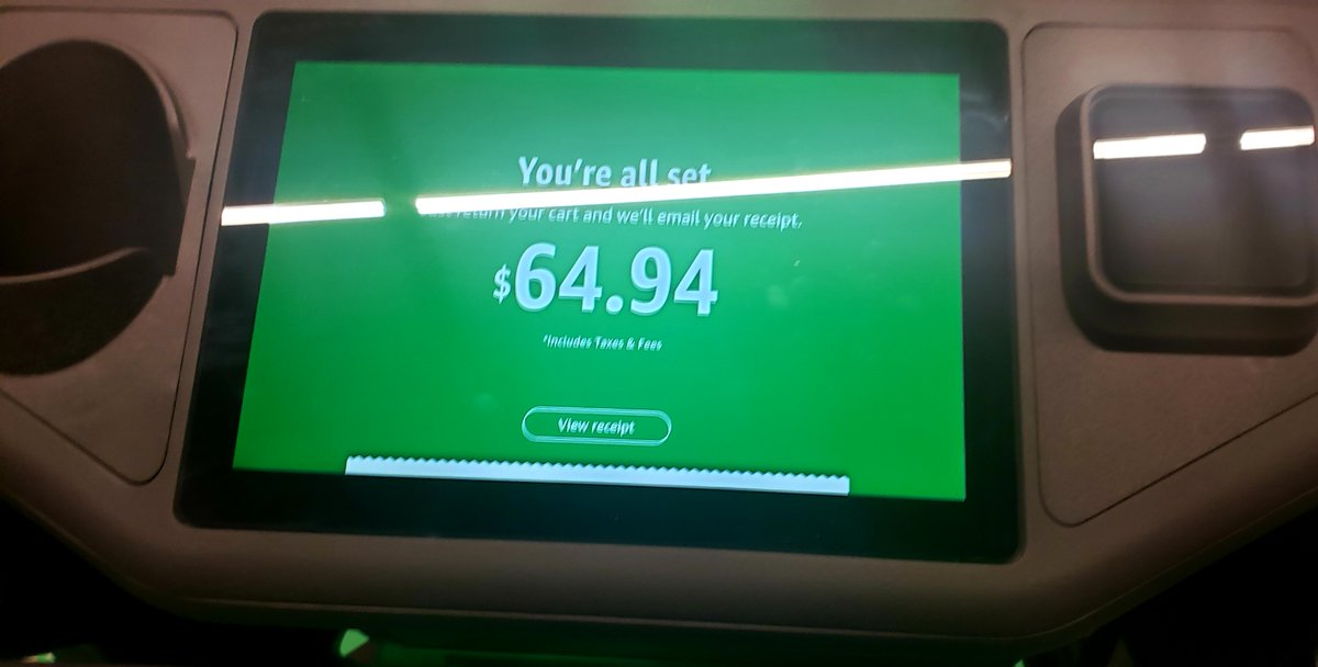 When using the Amazon Dash Cart experience, you exit through this lane, denoted by the balloons for the opening. A clerk was there to help acclimate shoppers to the experience. This is also the moment you would scan any coupons.