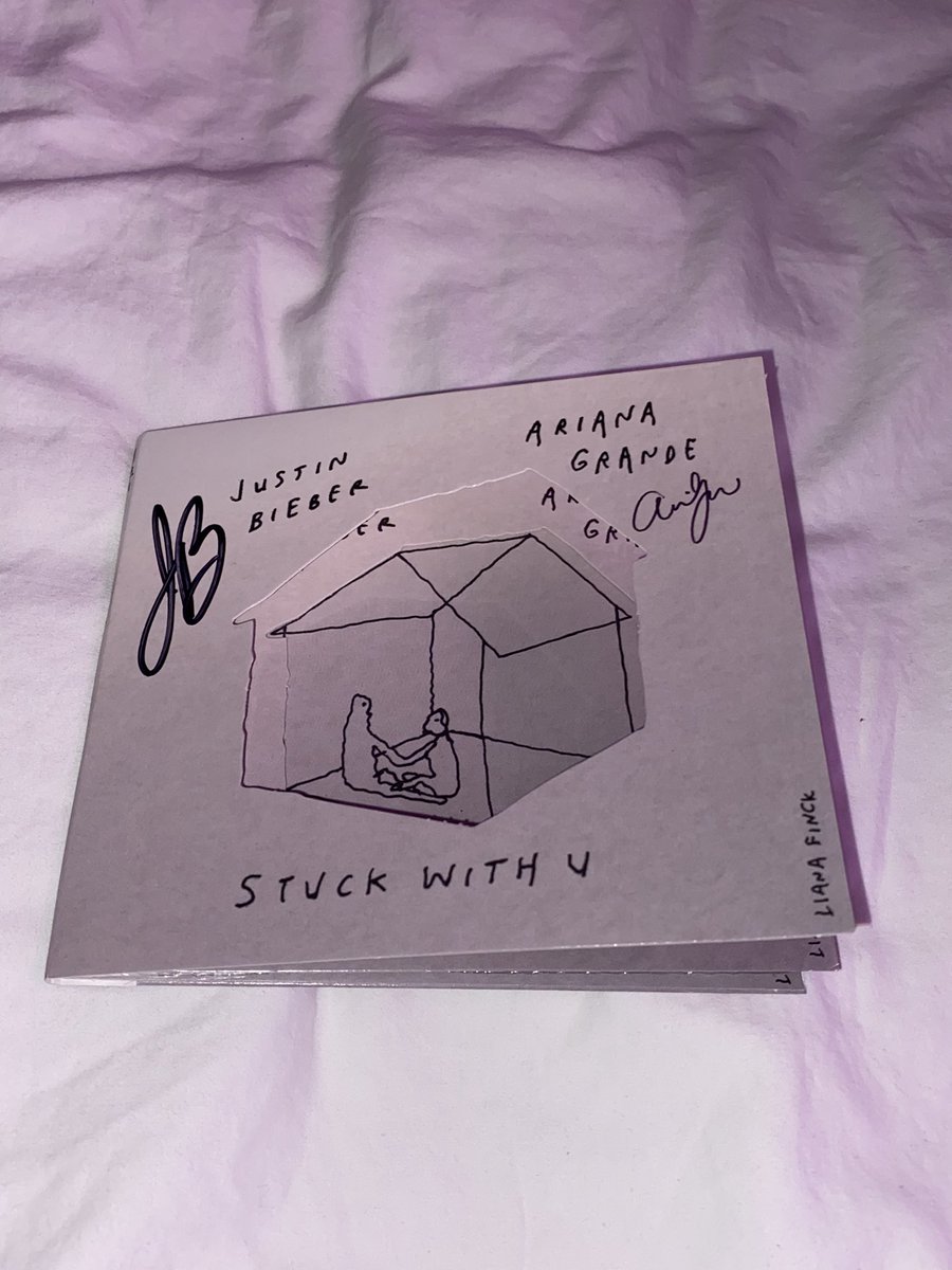 tunarianaa's tweet photo. my stuck with u signed cd is auto signed 🥲 @ArianaGrande @scooterbraun @justinbieber https://t.co/qV5L2f2ZfN