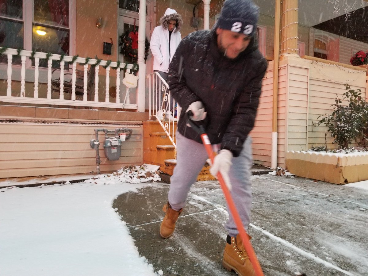 BerksMichelle's tweet photo. Mario Deleon of 740 N. Front St. clears snow from his sidewalk Wednesday evening during the storm. #berksweather https://t.co/ROlJnsSskd