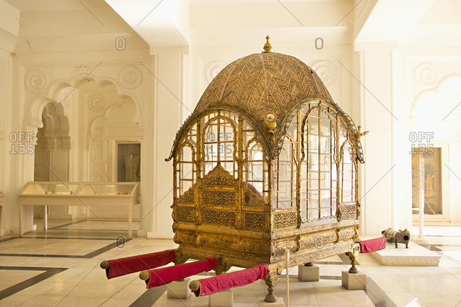 Palanquin at Mehrangarh fort Jodhpurit depicts choice, status of royalties of that timeseems of Gold?