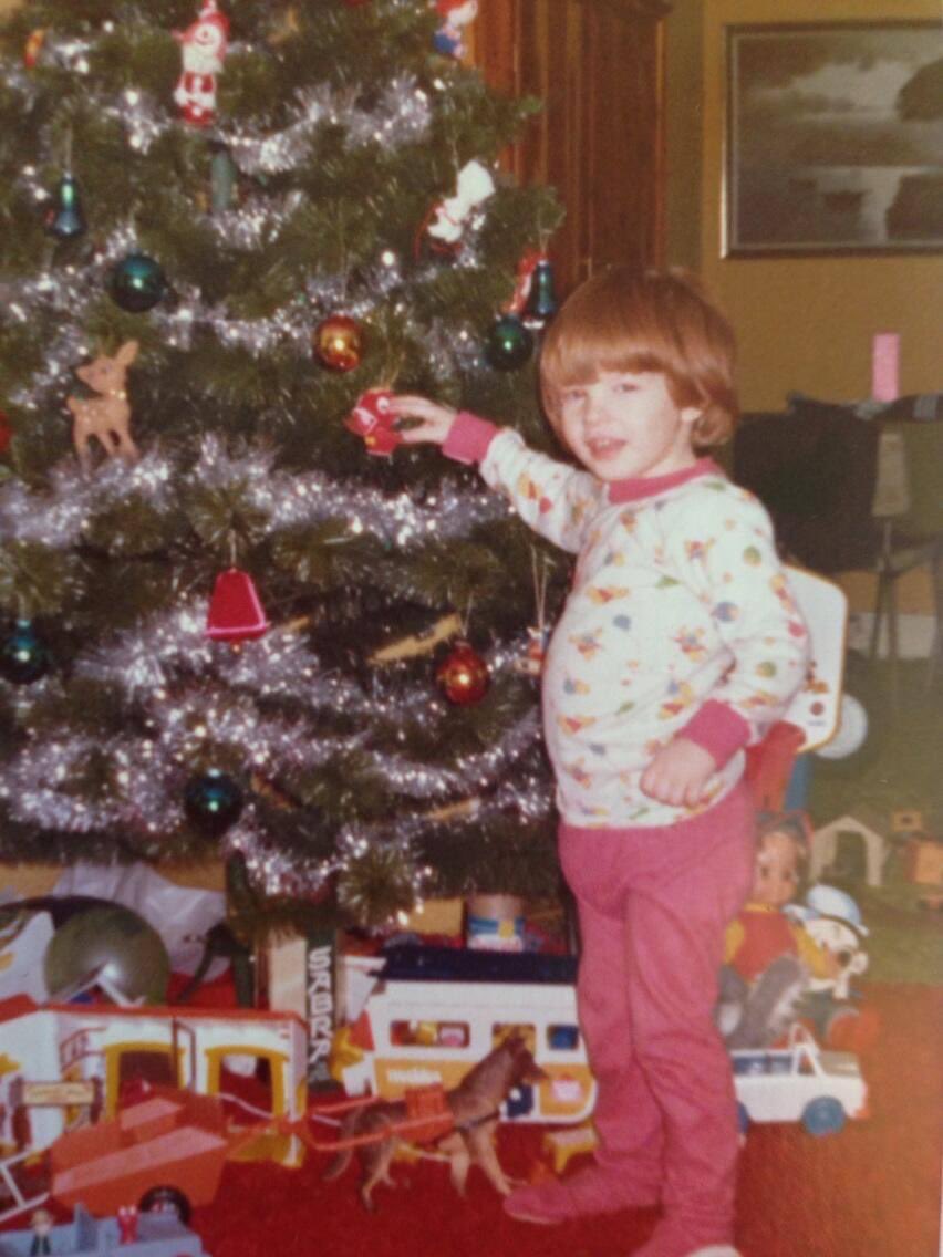 Now, I’m not griping — as Christmas morning was always wonderful ... but it was also a source of anxiety when I received so-called boy clothes or so-called boy toys. Distressing.  Even with the smiles. Here, I’m touching the magic bird because I’m having anxiety & bird helped.