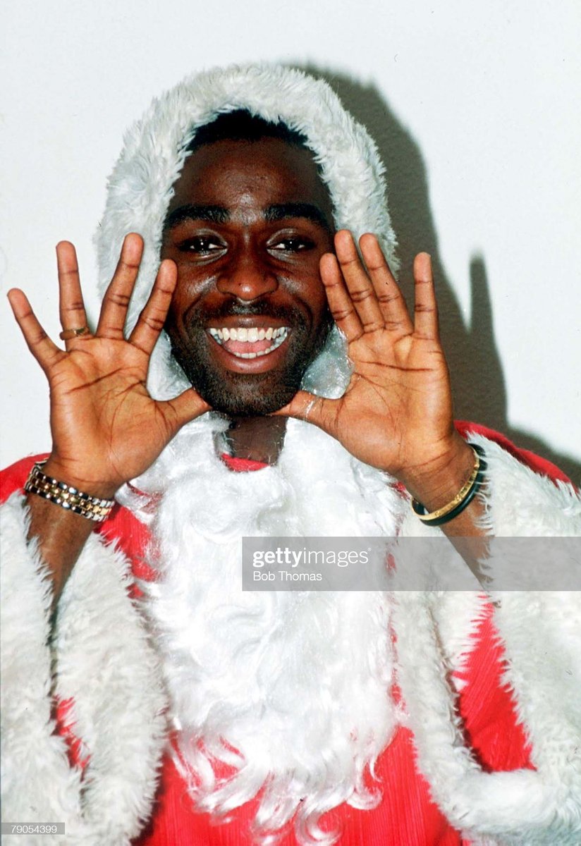 ManUtdGetty's tweet photo. Andy Cole dressed up as Father Christmas, circa 1993. (Photo by Bob Thomas Sports Photography via Getty Images) #MUFC https://t.co/oeRNgjhQ5U https://t.co/jqFGMDl9zu