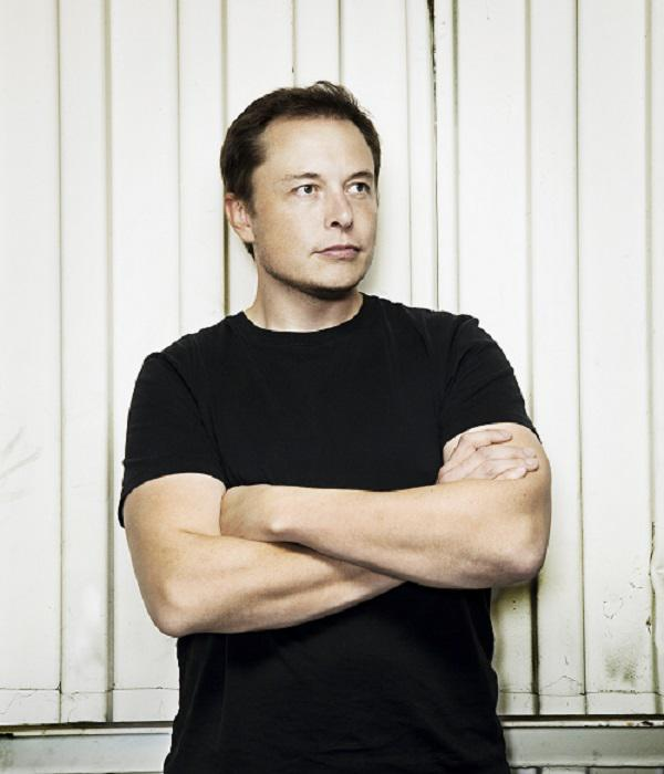 just for fun here are a couple of sets of elon photosfirst, the classic arm cross pose that photographers insist on, and that journalists/editors love to use because it's such a tropeI'll even throw in one of him facing the left, so subversive and contrarian