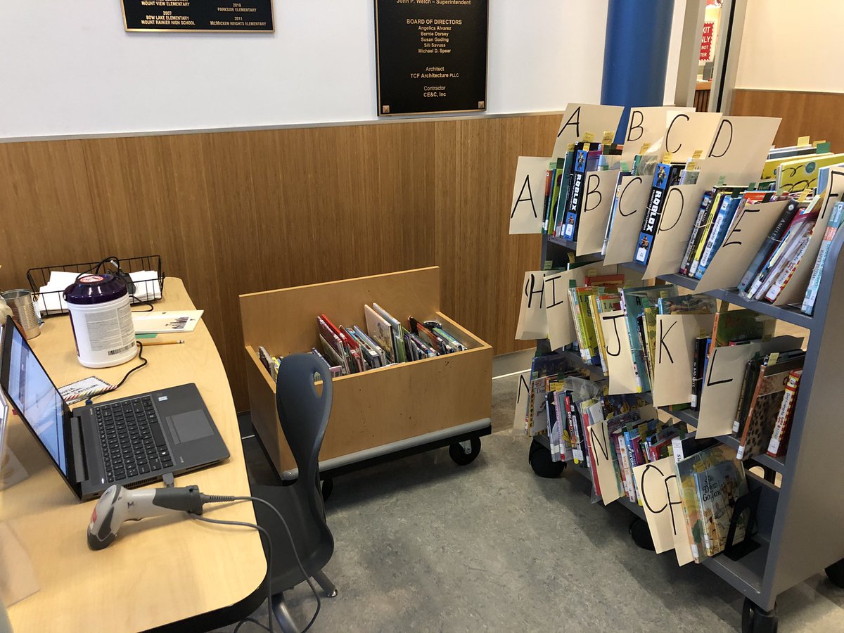 LibraryMcmicken's tweet photo. This is my curbside check-out set-up. Students put books on hold online and pick them up Wednesday afternoons. I checked out 160 books to students this afternoon! #wearehighline #mcmreads #highlinereads #10000steps #ilovemyjob https://t.co/8eoyE4yAGm