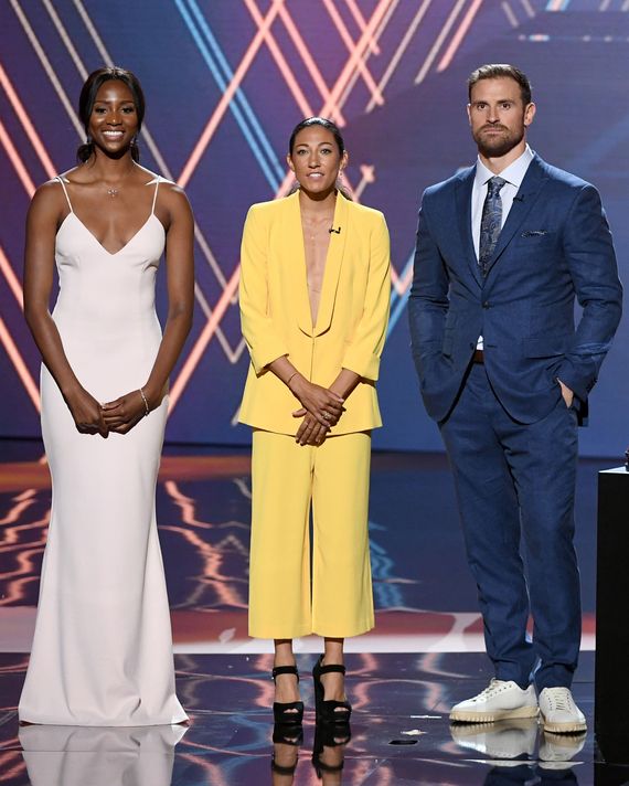 Christen Press in suits; a necessary thread. 