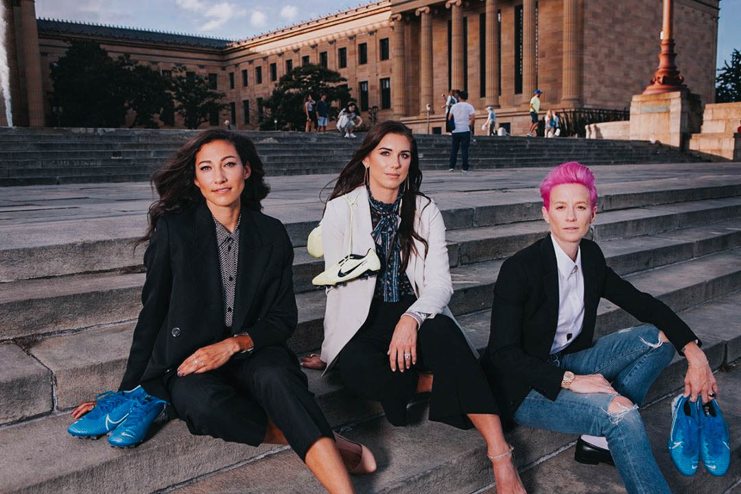 Christen Press in suits; a necessary thread. 