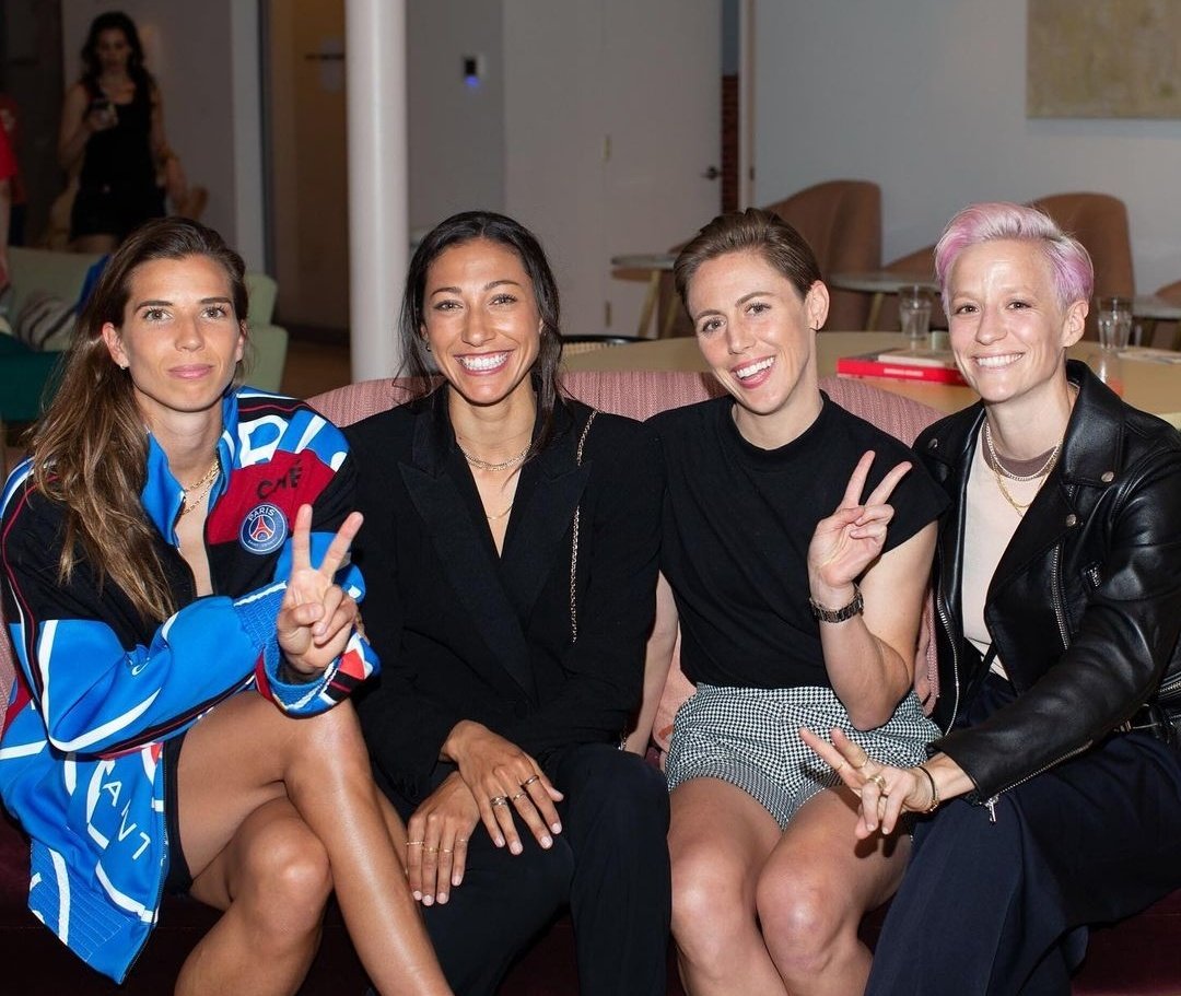 Christen Press in suits; a necessary thread. 