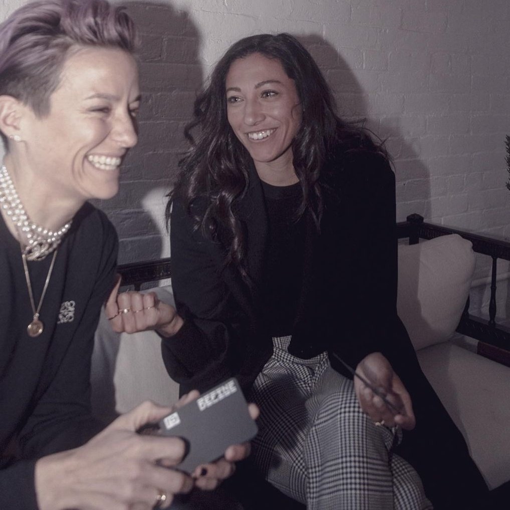 Christen Press in suits; a necessary thread. 