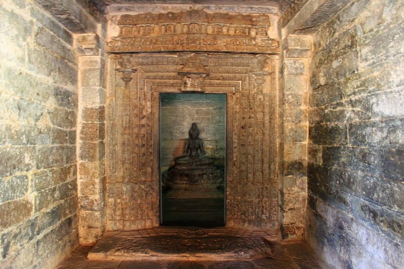Saraswati temple has sculptures of apsaras carved on the outer walls. The Saraswati sculpture is partially damaged. The deity is seated in a padamasana posture.(11)