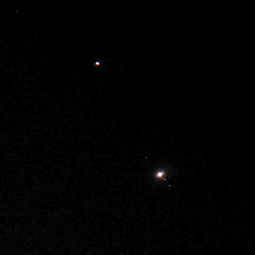 photosjpn's tweet photo. An amazing trifecta! The moon and (top right) “The Great Conjunction” of Saturn (smaller) and Jupiter! Also, in the third image, we can see the four largest moons of Jupiter! Kobe, Japan. #CNN #CNNSpace #space #moon #Jupiter #Saturn #greatconjuncture #planets #nature #science https://t.co/8189GS7eWC