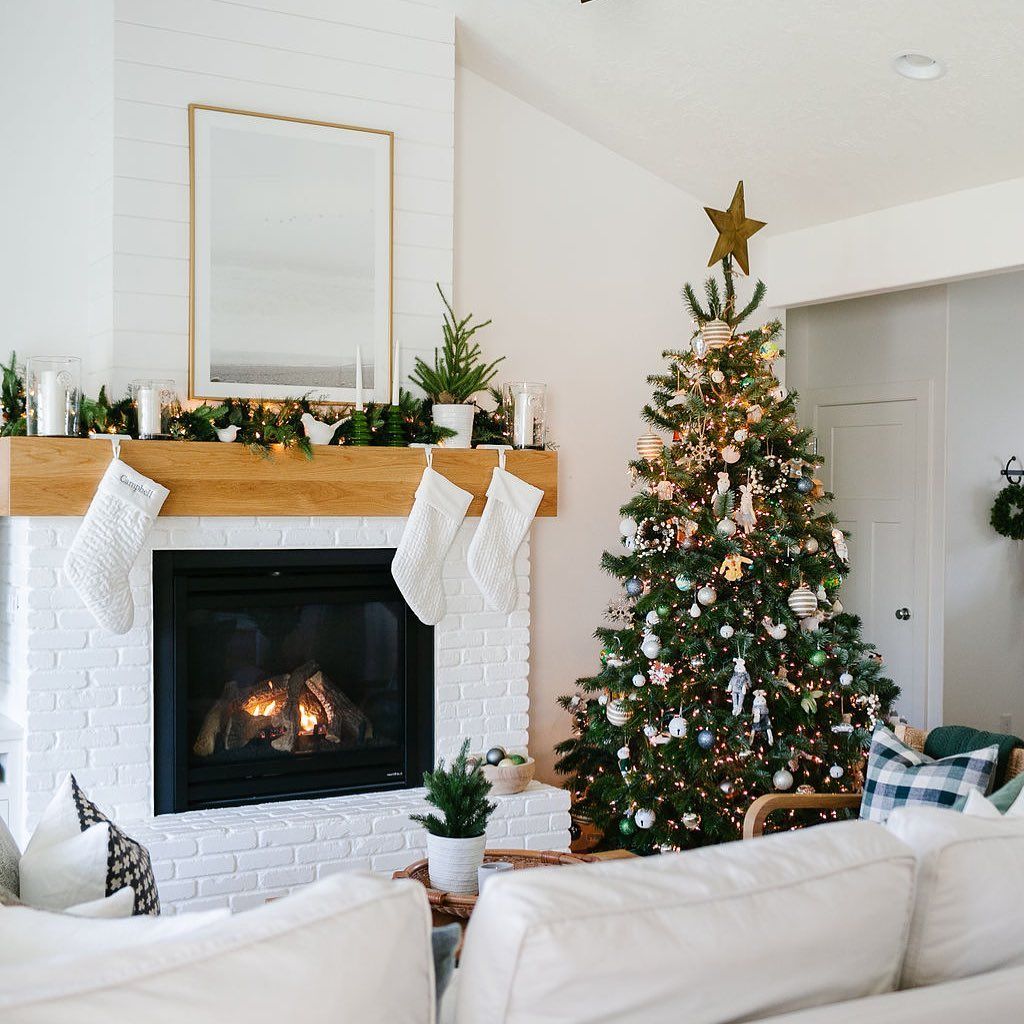 The epitome of holiday coziness, <a href="/sommerhome/">sommerhome</a>'s hearth wasn't always this inviting. Follow the link to see how she gave her fireplace a much needed facelift, taking it from cold to character-filled in just one month! buff.ly/3ajzCwX