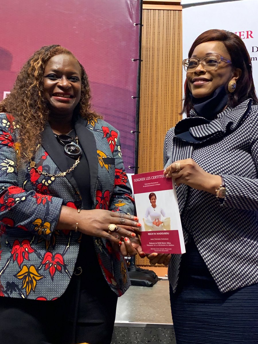 MariamTendou's tweet photo. Je suis toute ravie et honorée de recevoir mon livre dédicacé par SE Mme @MadougouReckya, ancien Ministre de la Justice &amp; Conseillère Spéciale du Président du #Togo @FEGnassingbe, son livre « Soigner les certitudes » préfacé par SE M. le Président @Macky_Sall du #Senegal #3FAA https://t.co/dYjR3DGbqZ