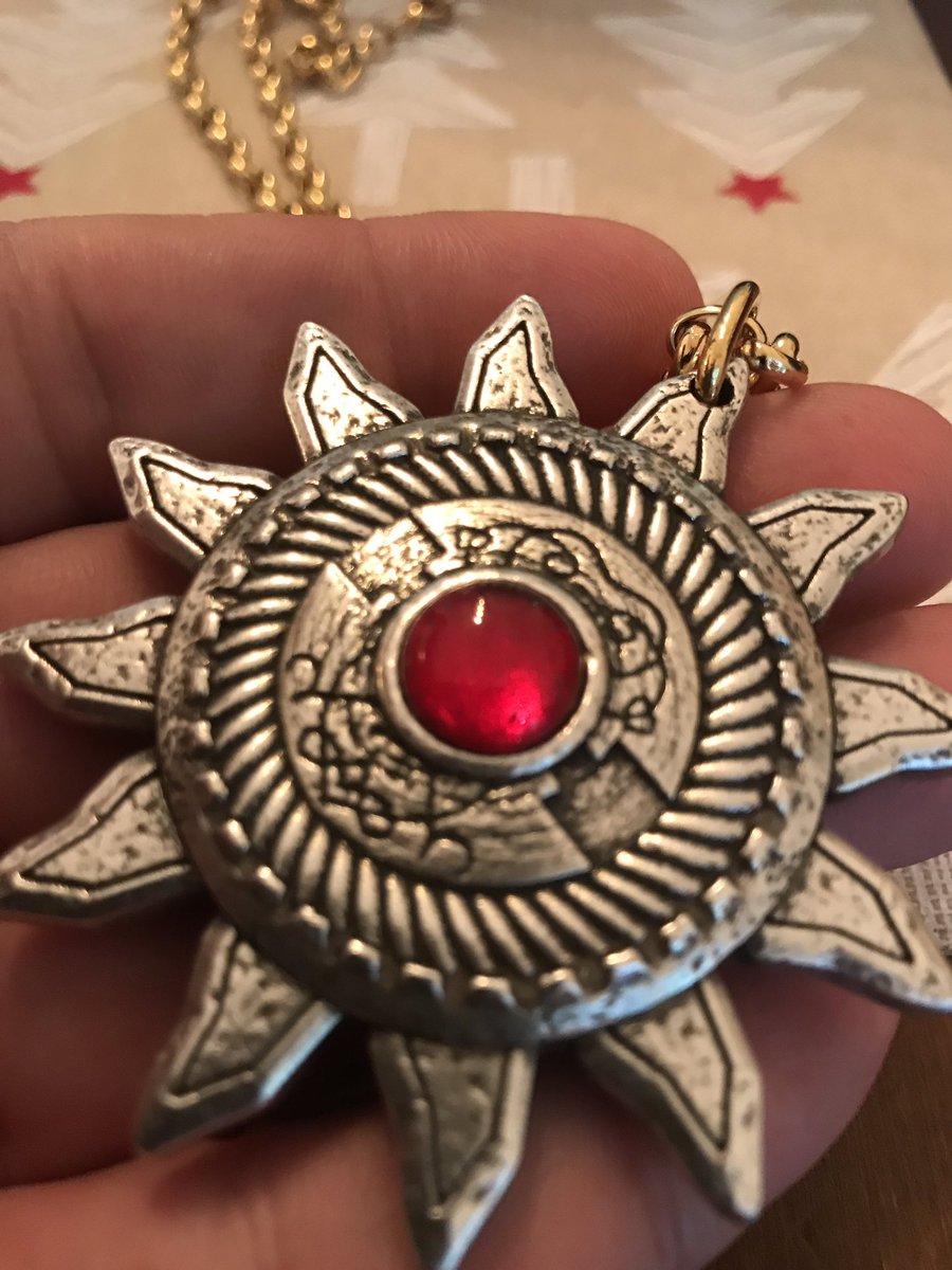 Props! The holy symbol of Ravenkind and three coins, embossed with Strahd’s face. These are metal. And heavy. Heavy metal. Imagine giving your players that! Very cool.
