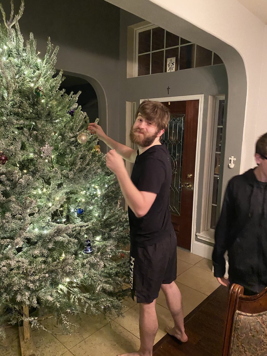 Texascopywriter's tweet photo. Decorating the tree last night! It’s SO far, we had to leave it in the foyer! There are a couple of other kids present, not in these pics. Will add in comments. #Adventtraditions #3rdweekofadvent #Catholicfamily https://t.co/nyLk91fb3Y