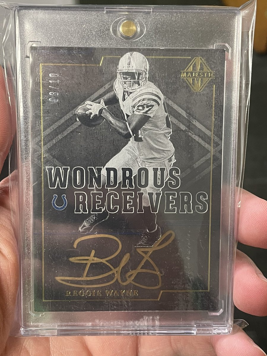 HoovRealtor's tweet photo. Day 17 of the @sportfanatic813 &amp; @Asmithcards #DecemberPCchallenge is one of my favorite Colts ever... Reggie Wayne
2017 @PaniniAmerica Majestic Wondrous Receivers Auto 8/10 
(8+10=18, that’s Peyton’s jersey number so that’s an Indianapolis Colts 1/1) #whodoyoucollect #thehobby https://t.co/nU3i5xyNww