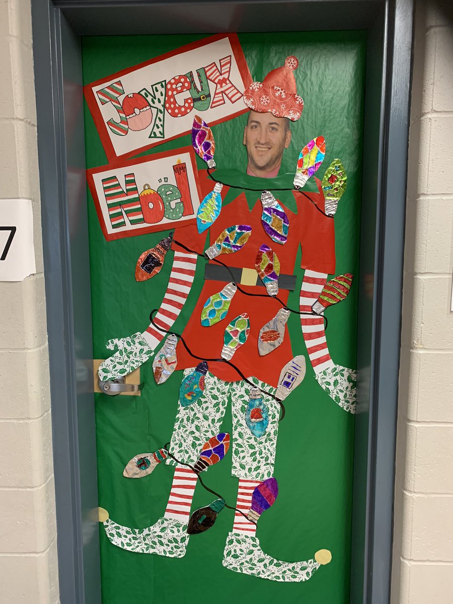 dannypalumbo's tweet photo. Door decorating contest at St. Thomas Aquinas. Which is your favourite? https://t.co/k63mP4xqD8