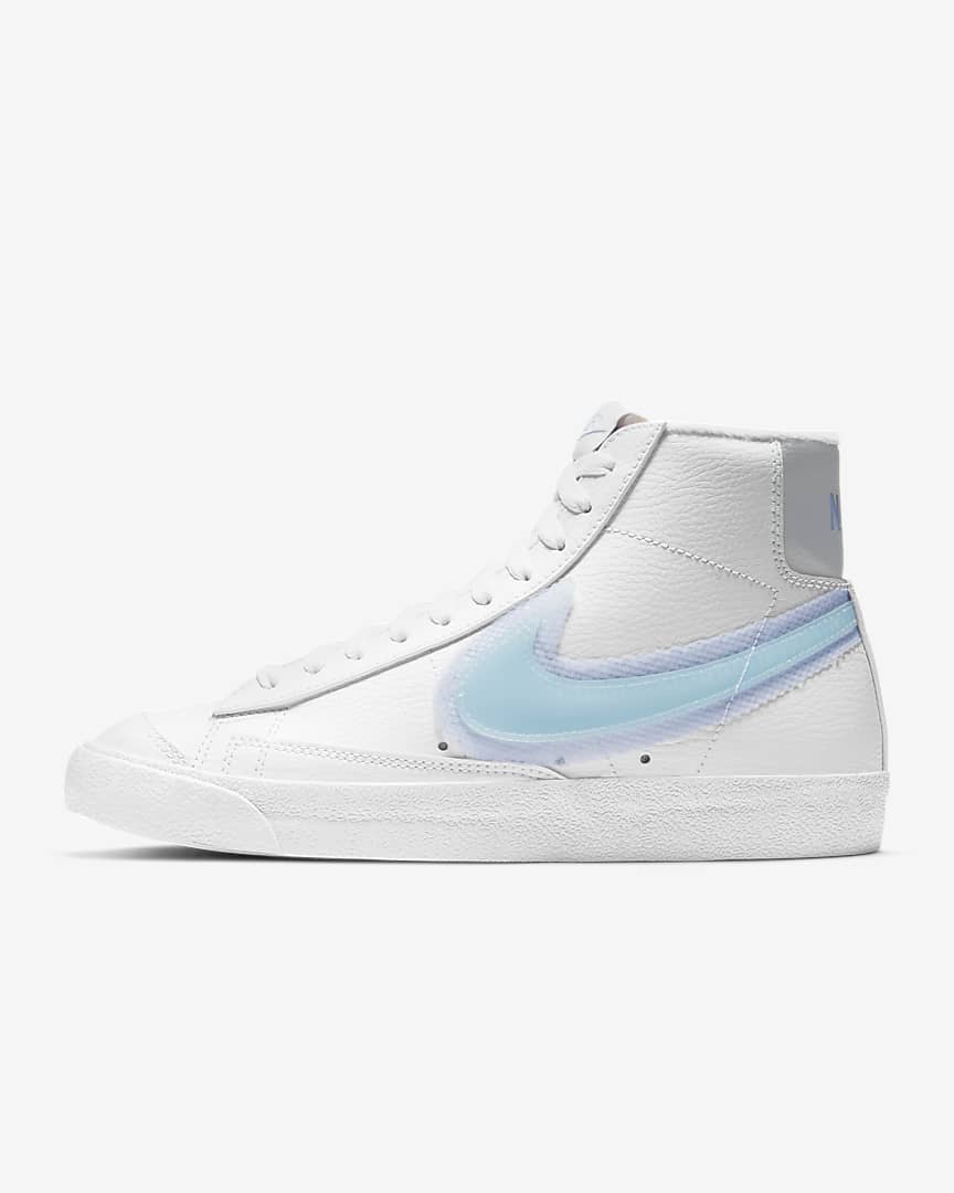 white nike with light blue swoosh