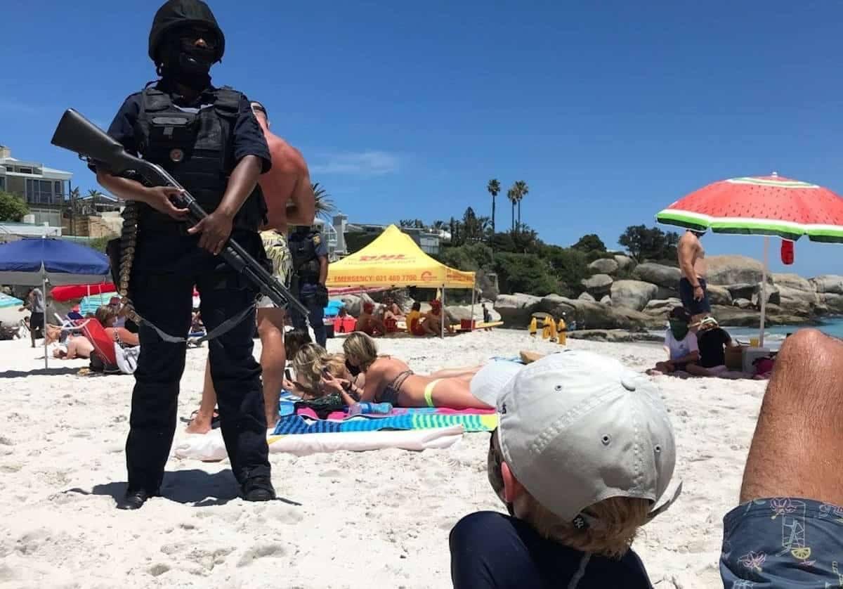 4KobusWiese's tweet photo. Today on Clifton beach! Why are armed police on our beaches, should they not be out in the streets catching rapists, murderers, fraudsters, gangsters and druglords, instead of “dangerous / violent “ swimmers! https://t.co/LRlTPCt2D5