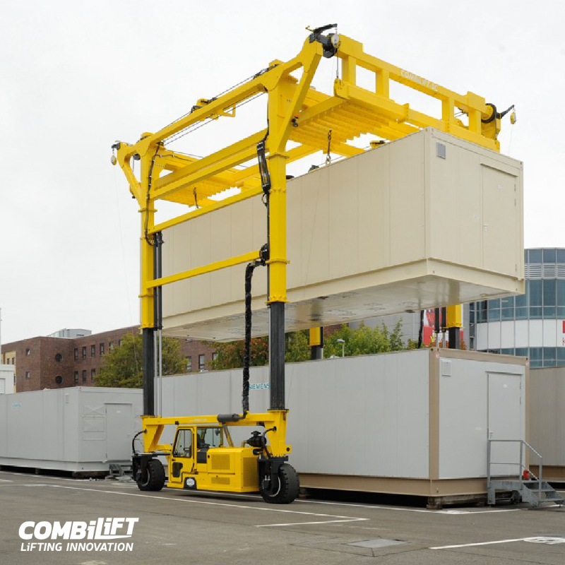Combilift's tweet photo. Our Straddle Carriers can handle heavy or oversized loads, including whole modular buildings. Find out how our Straddle Carrier range can make your business more efficient and cost-effective. #Combilift #CombiSC #Modular #OffsiteConstruction #ModularBuildings