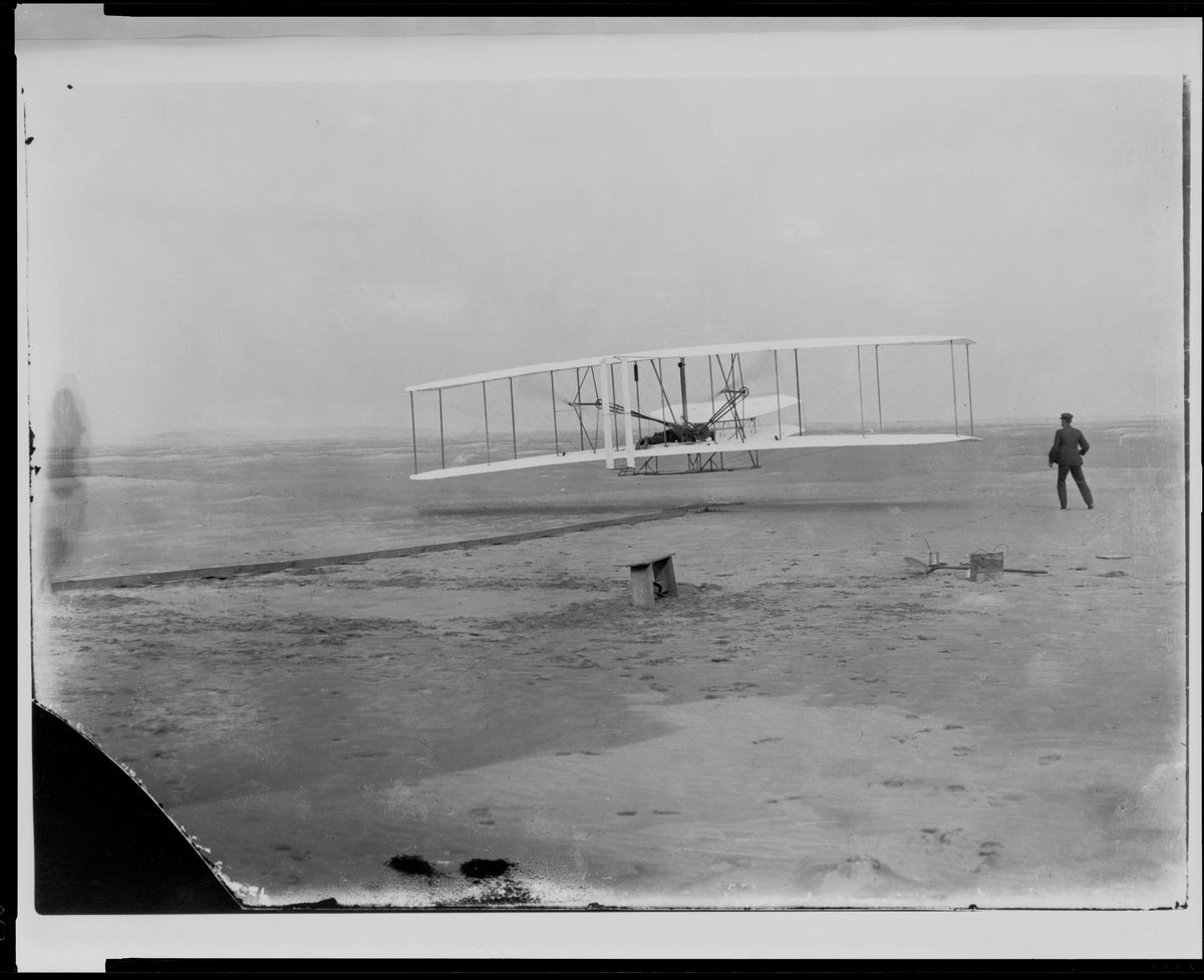 historyfaceapp's tweet photo. HistoryFaces [https://t.co/uA3WUtPCJL] remembers 12/17/1903, when Orville Wright (HF Series 1) piloted the 1st successful flight. In the attached photo, Wilbur is beside the plane. But do you really know which Wright is which? Which brother had the mustache? #OTD#wrightbrothers https://t.co/ivM2DJnK2q