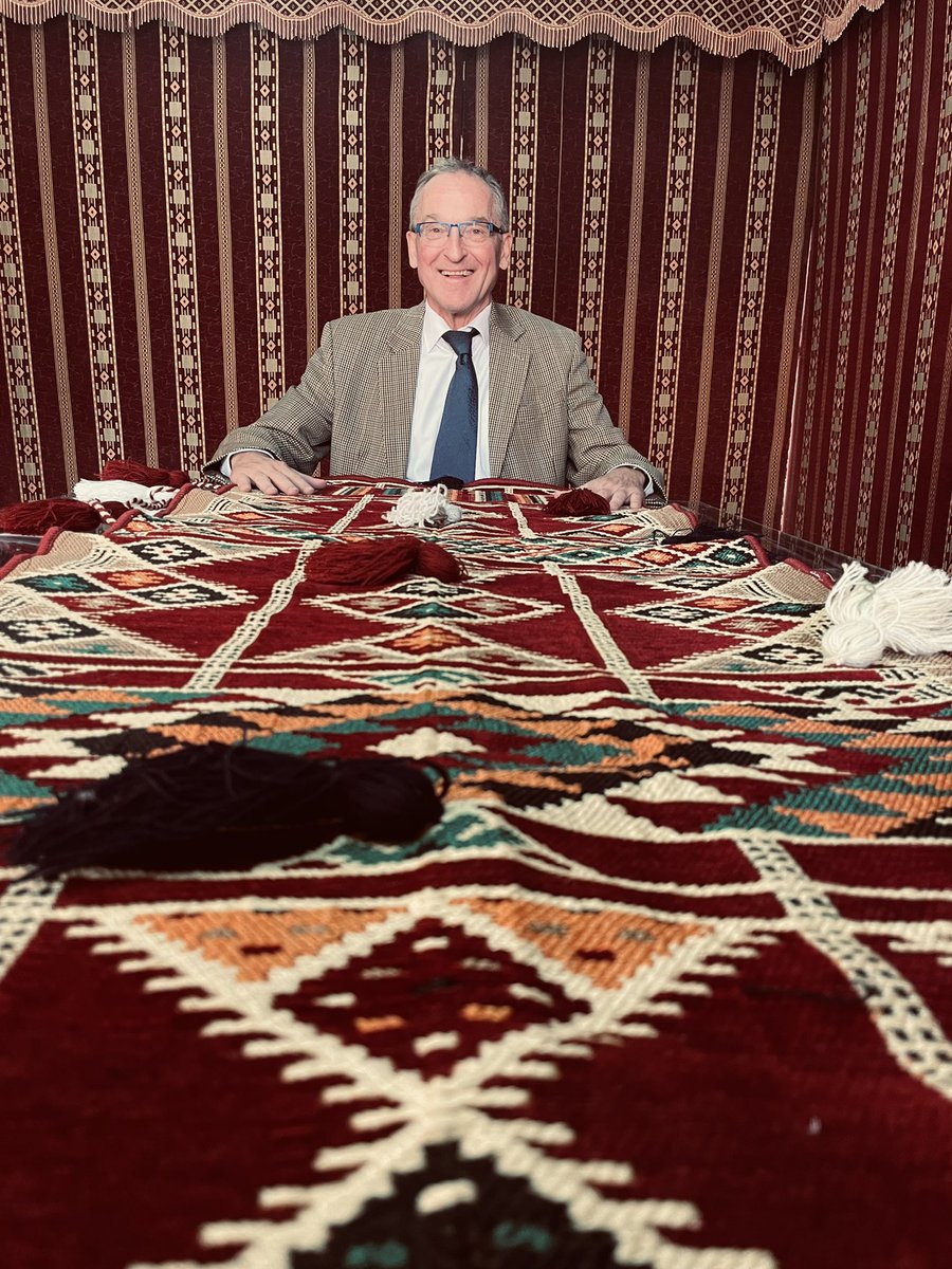 GermanyinKSA's tweet photo. German Ambassador Jorg Ranau admiring a piece of Al-Sadu weaving in the embassy’s premises in #Riyadh. 
“Congratulations to Saudi Arabia &amp; to Prince Badr Al Saud for adding Al-Sadu to #UNESCO’s list of #IntangibleHeritage”  🇩🇪🤝🇸🇦 https://t.co/FELcsd9BFV