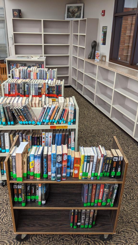 Clearing shelves and organizing by genre to make a new home for our  #equityrefresh books. Can't wait to promote these new, diverse titles with our students! #morebookcartslease, #plainsmenread, #yourehslibrary, <a href="/EpsLibraries/">EPS Libraries</a>
