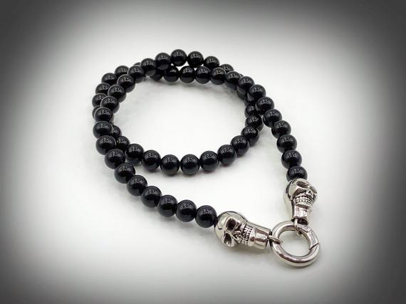 MorMalas's tweet photo. Black Beaded Necklace With Skull O Ring Cla https://t.co/W05BxpwXT3 #jewelry #necklaces #beadednecklaces #skullchoker #skullpendantcollar https://t.co/Rf4c7yRjpG
