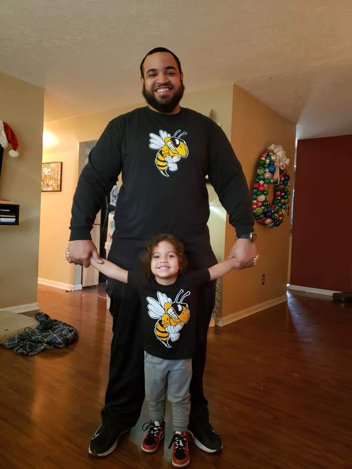 LCJackets's tweet photo. Boys Assistant, Coach McCracken and son Maddox. Start em out early on some Central Swag! @loucentralsport @LouisvilleCHS #babyJacket #swagschool #JacketPride 🐝🐝🏀🏀 https://t.co/O3r7L4W6Sy