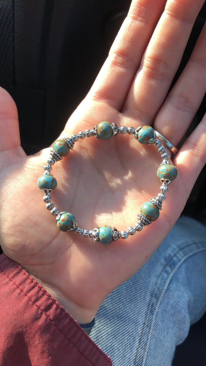 lexi_ranney's tweet photo. For almost 7 years I’ve saved my moms flowers from her funeral to do something special with them I just never knew what. My fiancé got me this beautiful bracelet with beads made out of those flower petals for Christmas and the tears won’t stop. I’m so blessed 🥺❤️ https://t.co/6ahbOWle7h