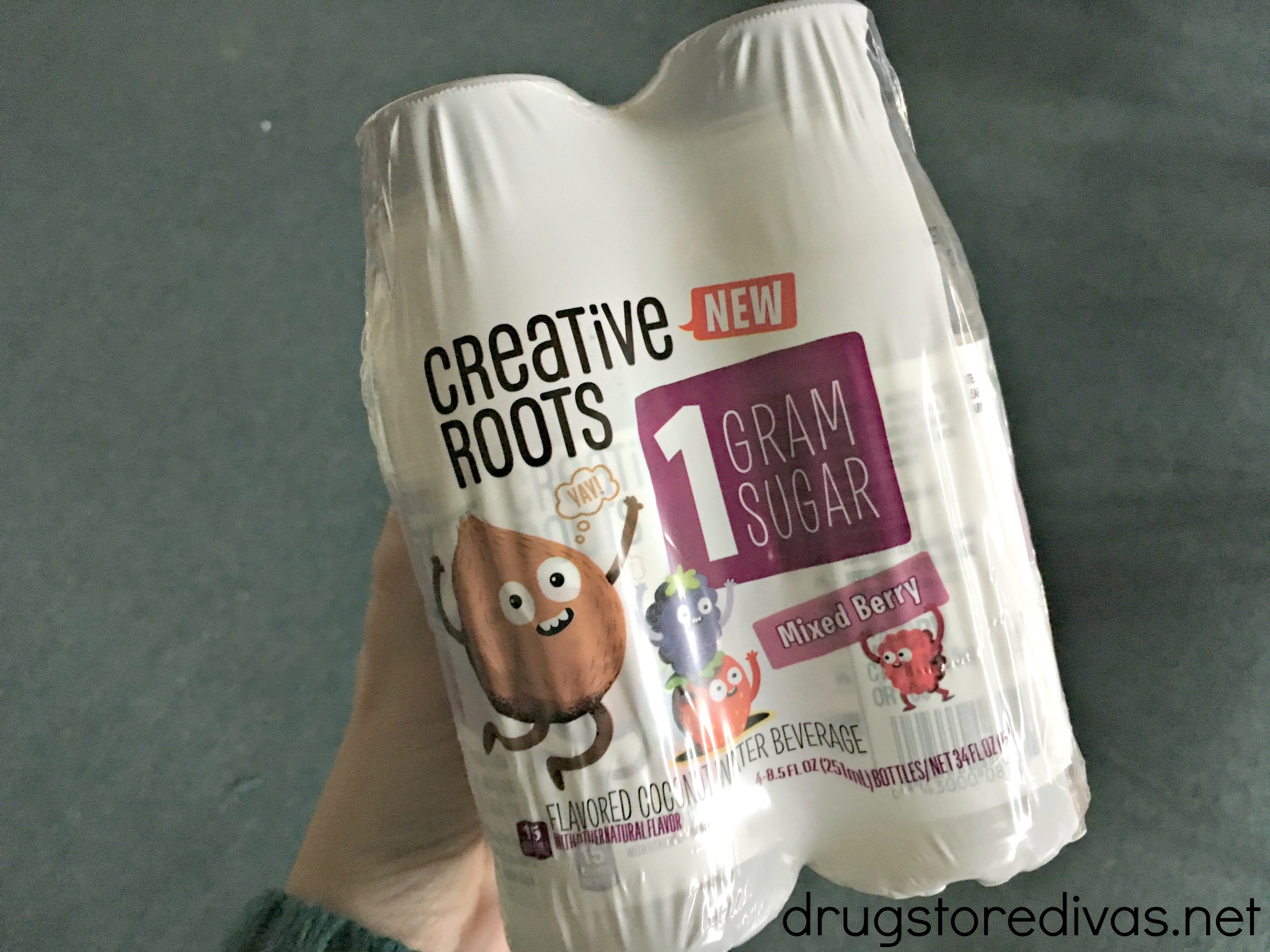 A pack of Creative Roots water.