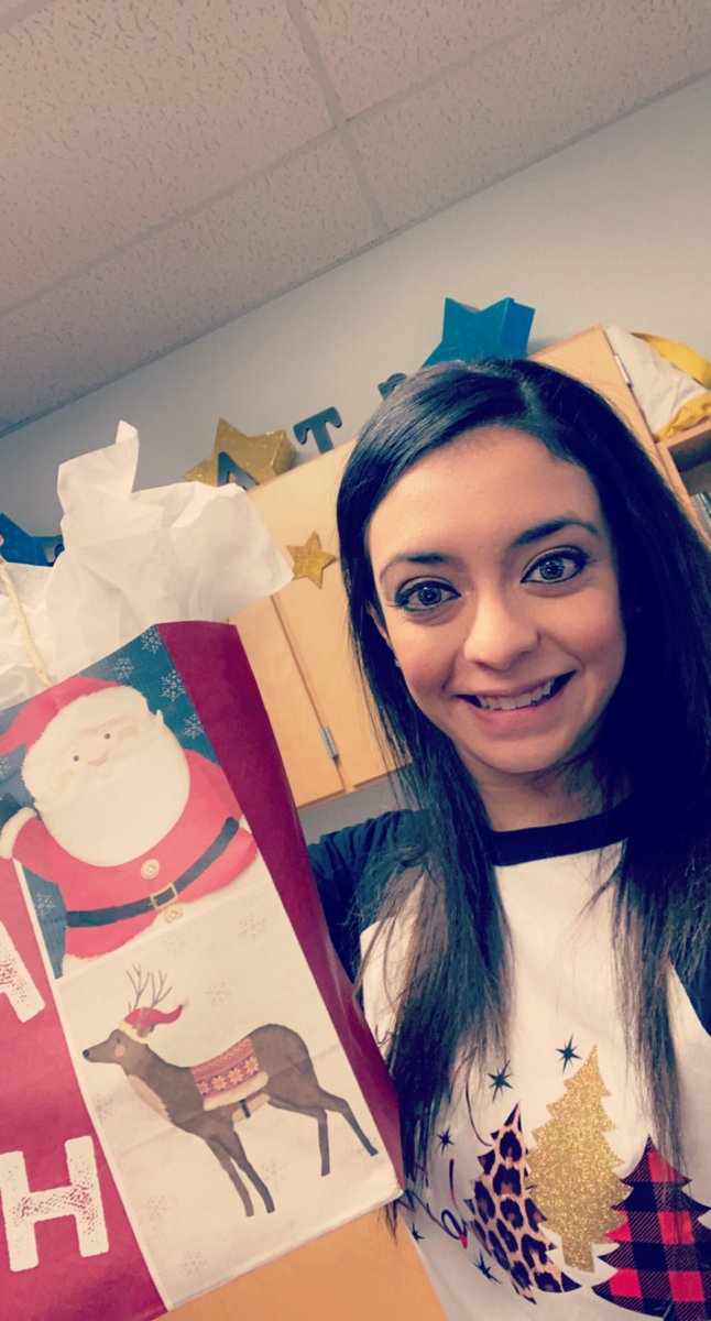 ValerieJNunez's tweet photo. Selfie giving gifts and with Christmas head gear @NISDMichael #STARJOY https://t.co/PBZclts0nS