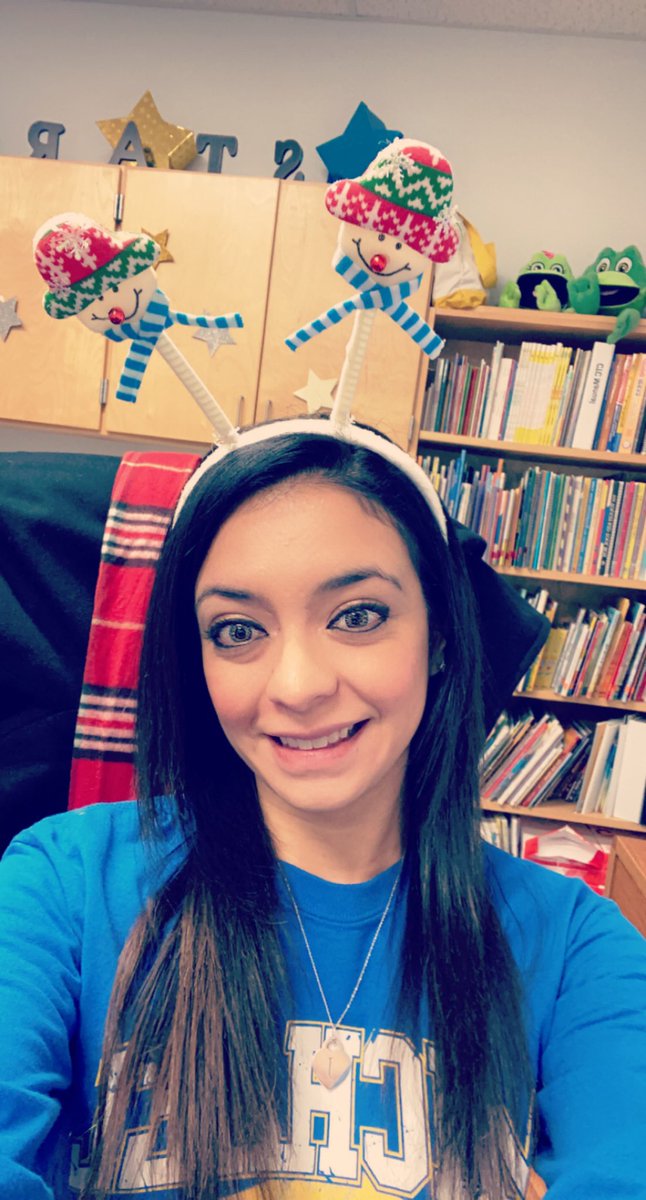 ValerieJNunez's tweet photo. Selfie giving gifts and with Christmas head gear @NISDMichael #STARJOY https://t.co/PBZclts0nS