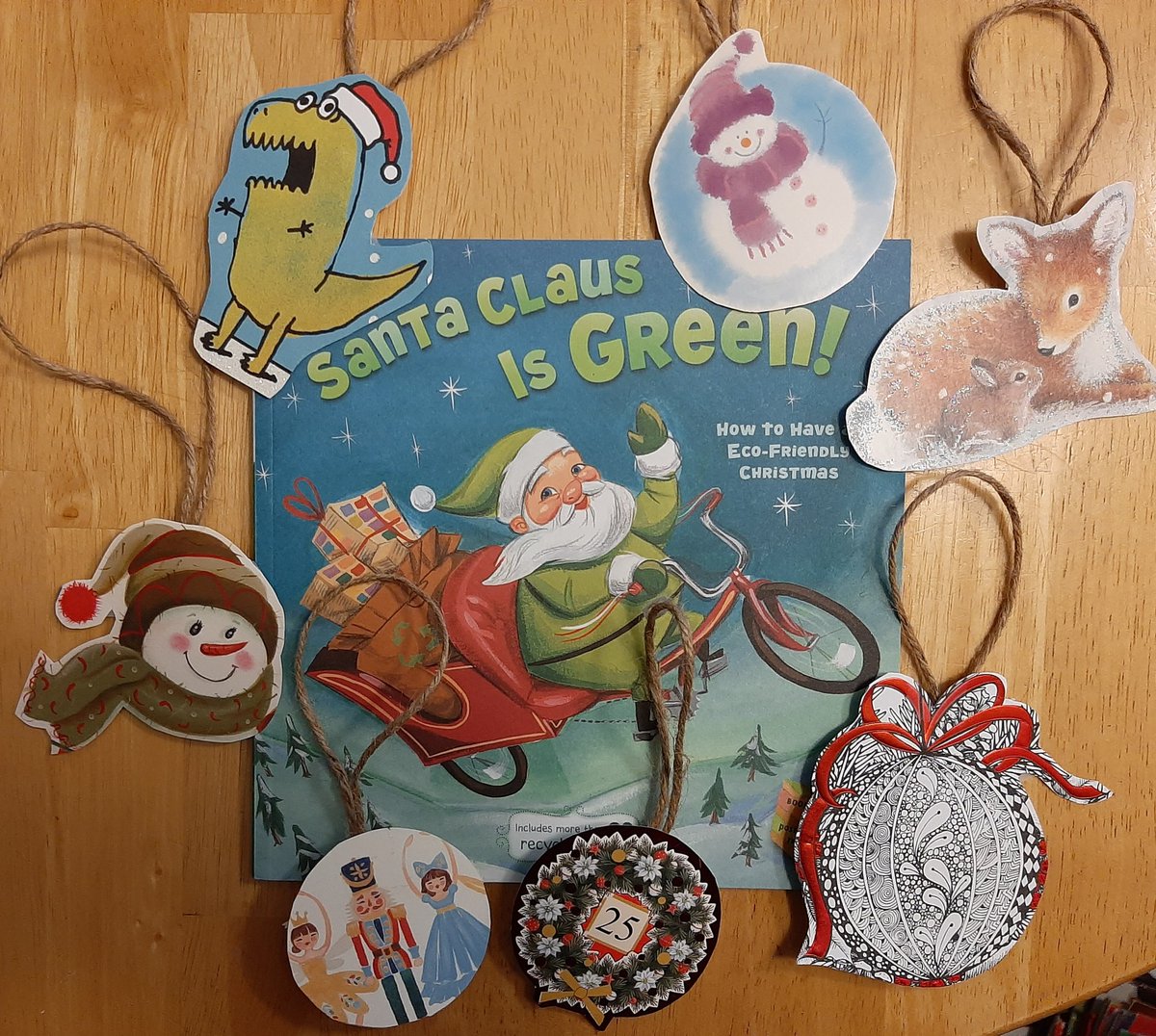 Today in remote FDK we read the book Santa Claus is Green about how to have an eco-friendly winter break! Then we repurposed old holiday cards, pictures, and magazines into ornaments/tags and other gifts to help cut back on waste during the holidays. #hwdsb #EcoFriendlyChristmas