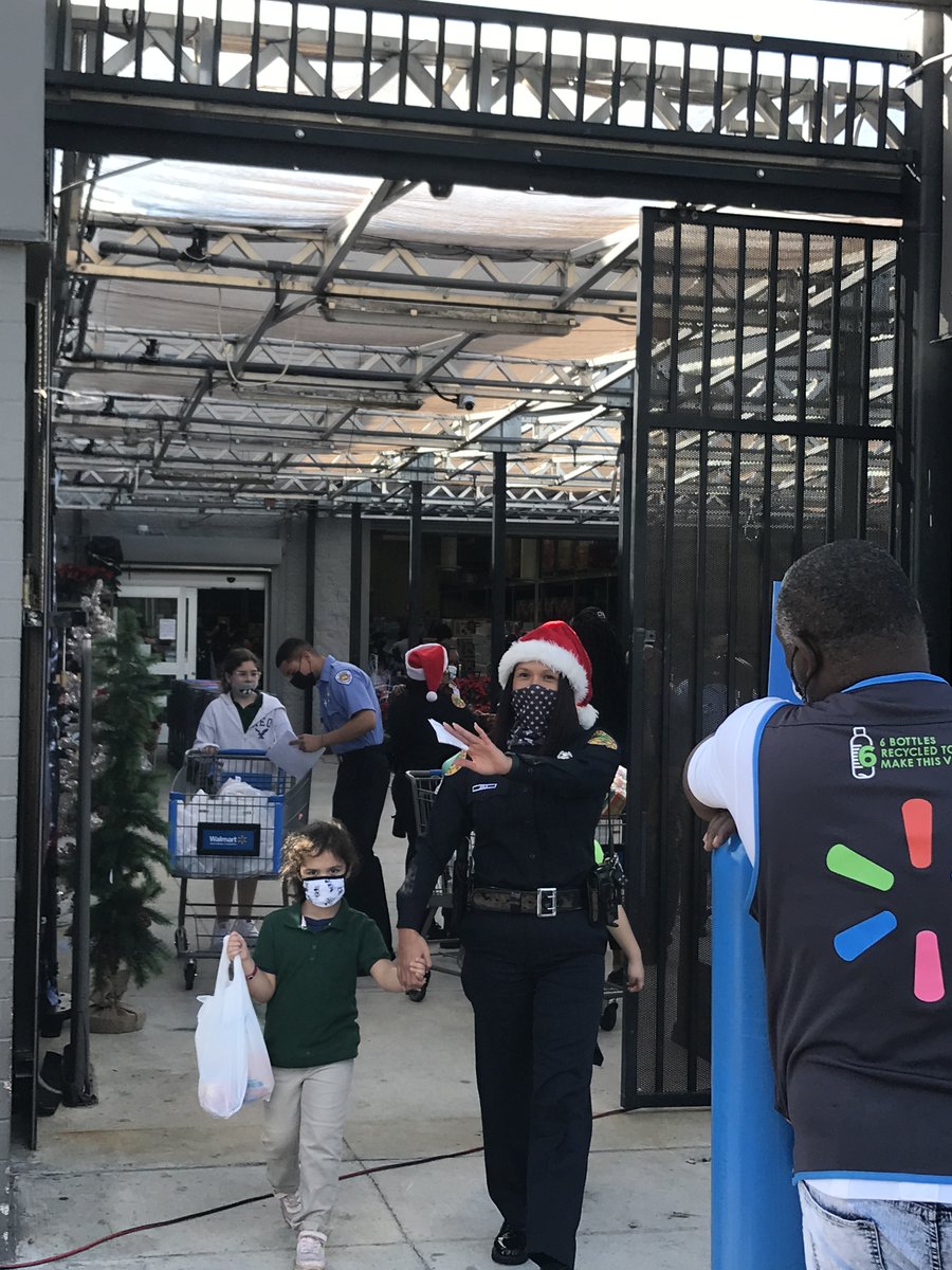 BrokerESilio's tweet photo. A huge heartfelt Thank you goes to @Walmart and @MiamiPD for making the holidays brighter for kids in our #Allapattah community.  Special thanks to Commander @ErnieSierraMPD Ofc Odio, Srgt Rodriguez, Ofc Avila, Ofc Ruiz, Ofc Juste &amp; S. Guerrero for their benevolence! https://t.co/uFN541aONl