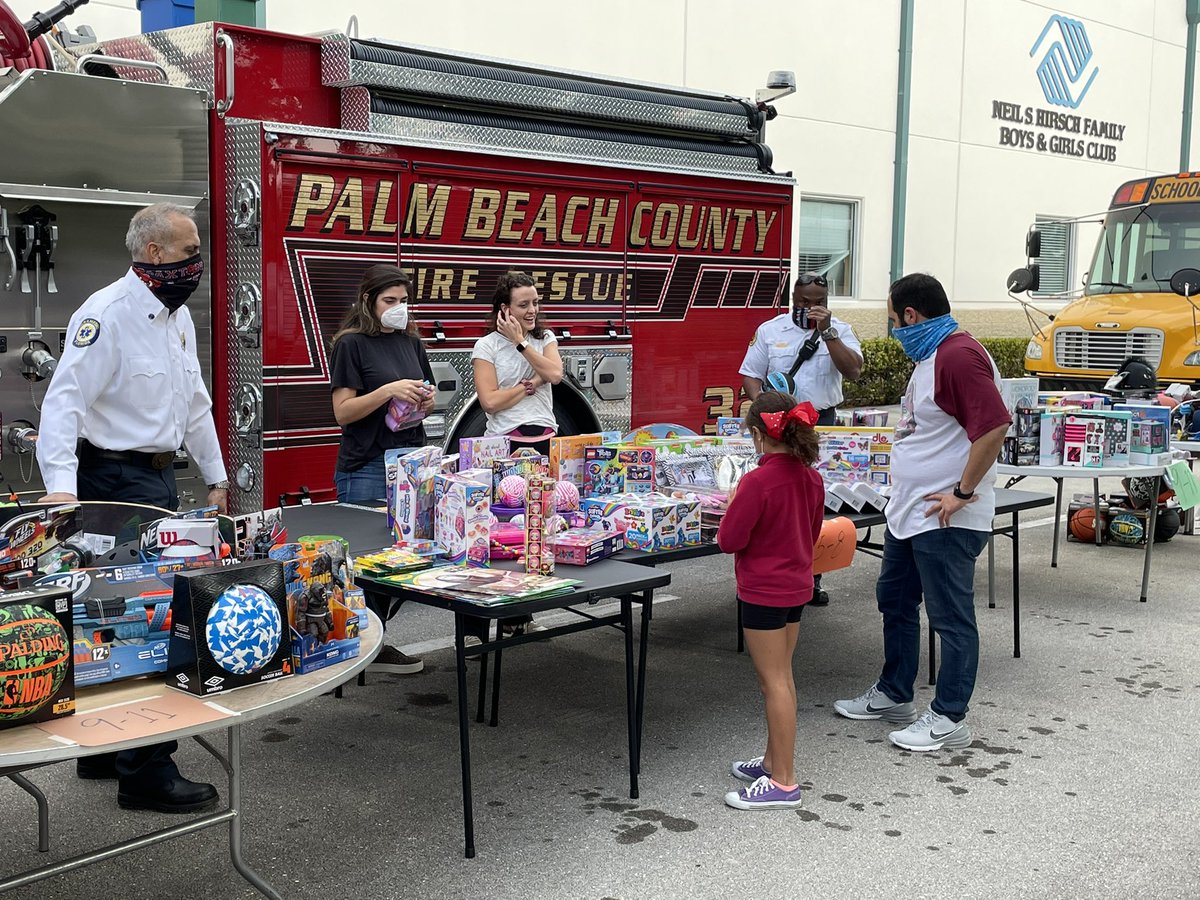 PBCFR's tweet image. #PBCFR took part in a toy give away in Wellington today. #Firefighters went on a shopping spree for toys for all different age groups and then delivered the toys in their trucks to the Boys and Girls Club. The event brought smiles to many parents and children.