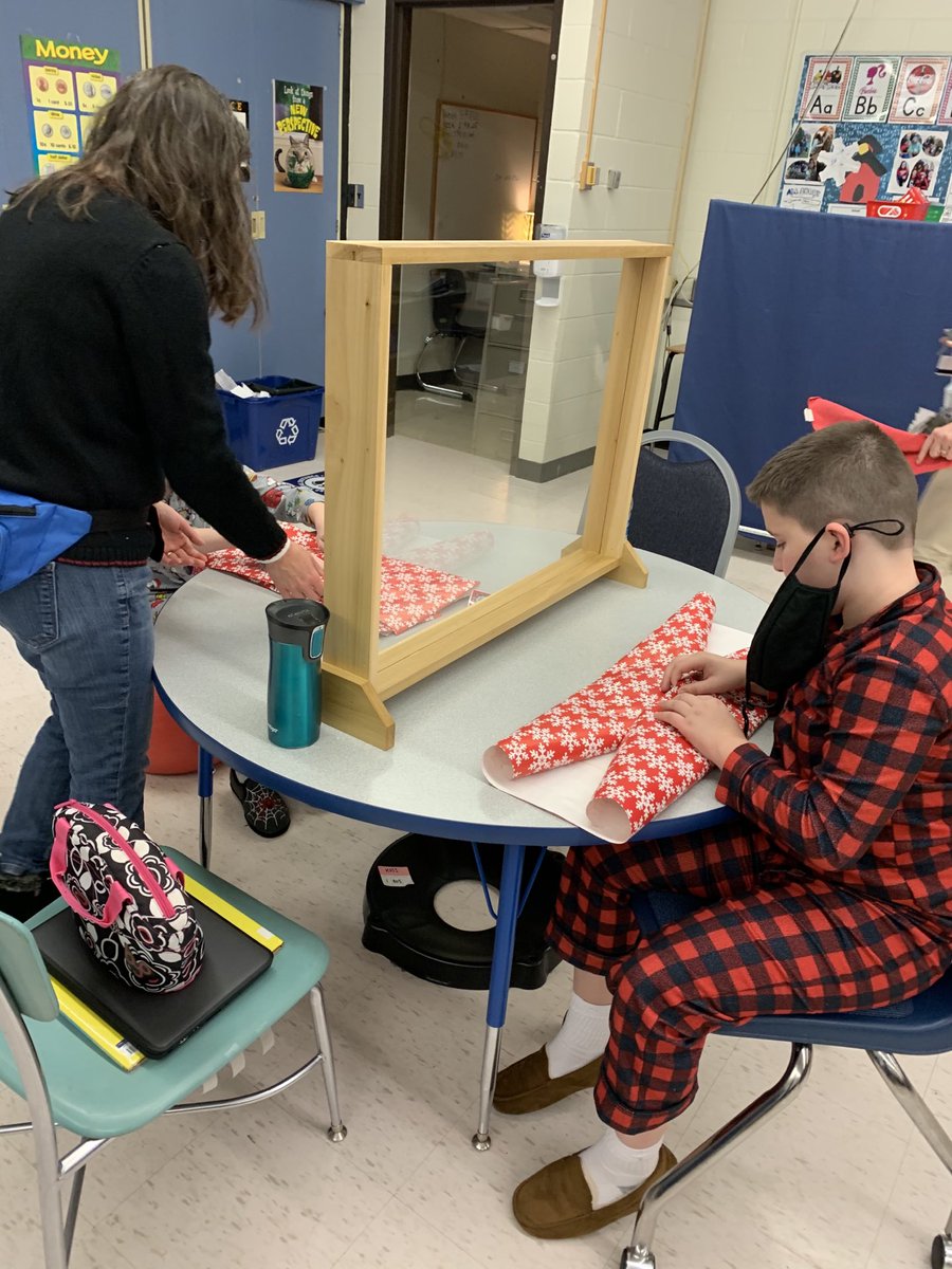 MissKossHCS's tweet photo. First time wrapping presents for some of these kiddos 🥰 #EWpride https://t.co/dViN0GjW25