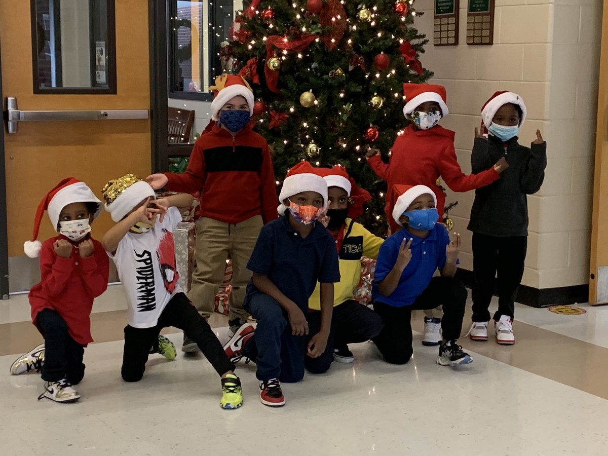 TorresKCubs's tweet photo. Christmas shenanigans  by the tree! #ncssbethebest #weareone @LIVEOAKELEM @ErickaLiveOak @crewscontrol47 https://t.co/DQsdYlWywl