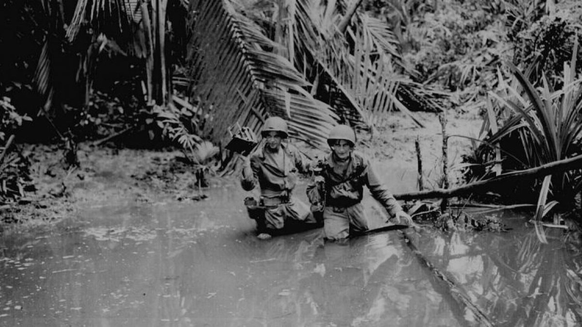 7/12:After failed Dec 5, 1942 assaults by 128th Btn, SSgt Bottcher volunteered to lead 30 men to drive a wedge towards the beach between Buna village strongpoint and their base at Buna 'Mission', to cut the Japanese line.The last 12 men went under hot fire thru' jungle & swamps