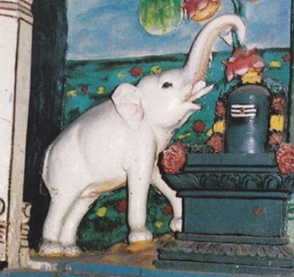 The elephant stood mesmerized seeing the beautiful Shivlinga.He saw a nearby pond & entered it.The wild elephant vanished & in his place stood a white Airavata in his former self,remembered everything.He performed abhisheka of the Shiva linga & placed lotus flowers from pond.