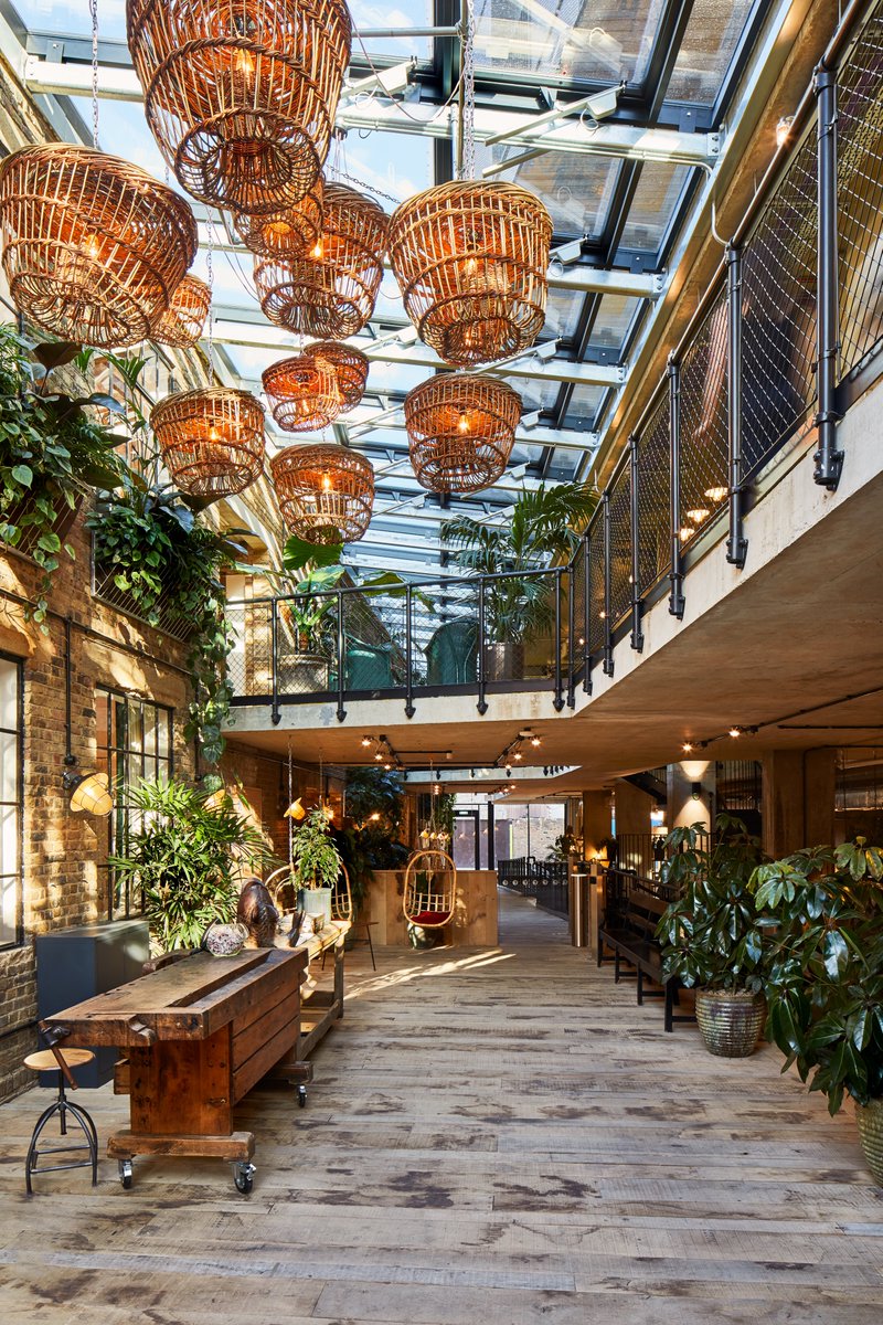 Hollawaystudio's tweet photo. The purpose built co-working space is home to 400 members who enjoy the benefits of large open and communal spaces, over 1000 indoor plants, a podcast studio, photograph studio, library and events space. The architectural structure of the space allows for easy flow between areas. https://t.co/9BwNLVqKQf