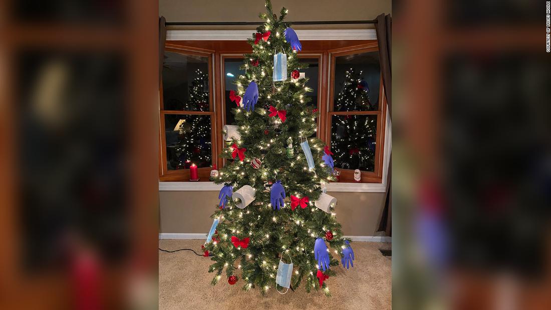 CNN's tweet photo. "Laughter is the best medicine. If (I) didn't laugh about the situation, I'd either scream or cry." 

These doctors and nurses are celebrating the holiday season with Christmas trees adorned with PPE https://t.co/xTzlYOBarh https://t.co/CxoQG8VWN5