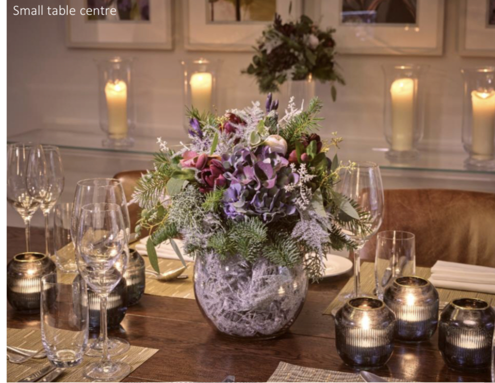 Simple but striking table centres. ⁣
⁣
Are you choosing a traditional look this year with vibrant reds, golds and greens or going more natural with pines, lichen twigs and Ivy?
⁣
Either way we're can create something impactful for your Christmas table, there is still time!
