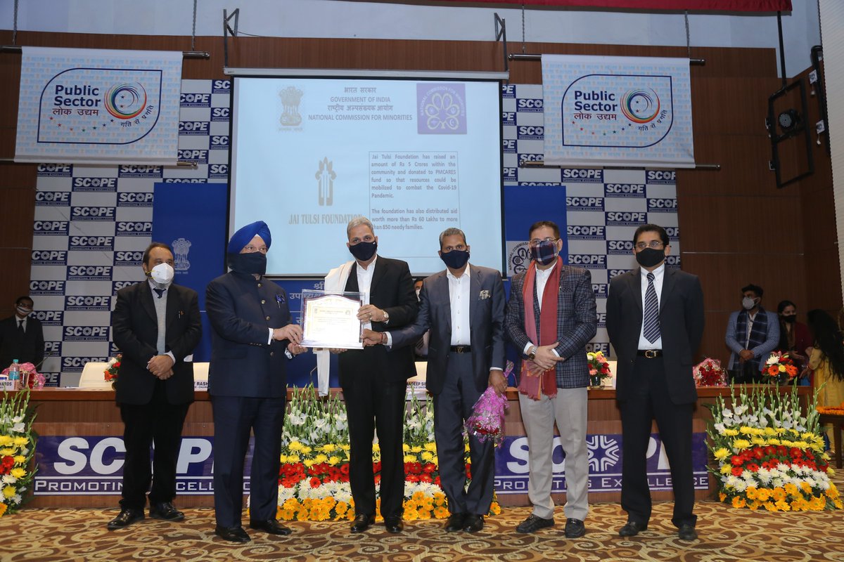 NCM_GoI's tweet photo. Shri Hardeep Singh Puri, Hon'ble Minister, Ministry of Civil Aviation and Housing and Urban Affairs,  presenting Momento to Mr. Tulsi Dugar &amp; Mr. Kamal Dugar at Minority Day Celebration by NCM in Presence of Shri Atif Rasheed, Hon'ble VC, NCM.
@AtifBjp
 @TulsiJay https://t.co/mO0meaMIP1