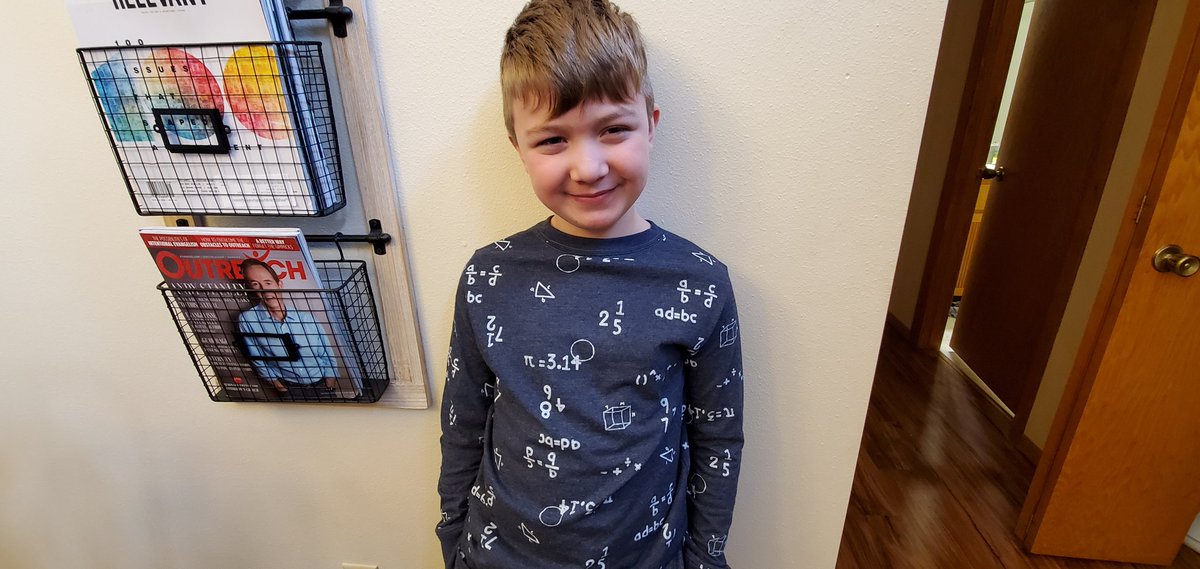 Mrs_Homan3's tweet photo. This math-loving boy is so excited to wear his math shirt for "Read My Shirt Day" @KellyGFPS! https://t.co/phCLBMPScB
