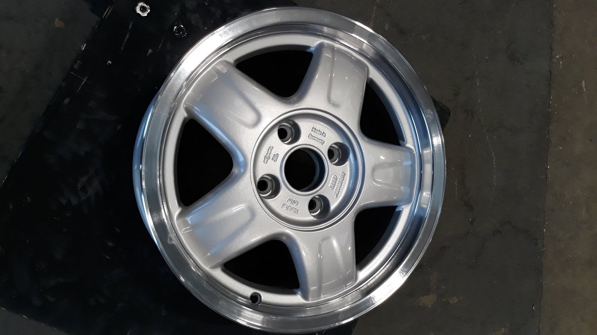 Next job was to have the original wheels refurbished. It's sat on the other ones for about 8yrs and I got used to it, they didn't look sporty, it's an 80 Sport. I think they looked nice, but I wanted it back to original. Before and after pics.